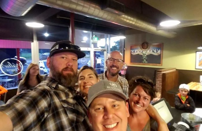 group of friends clebrating at walter's303 pizzeria